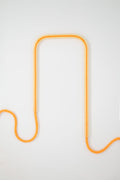 Front view of Citrus Glow glass self-watering insert on a clean white background showing its bright, vibrant yellow and citrus tones.