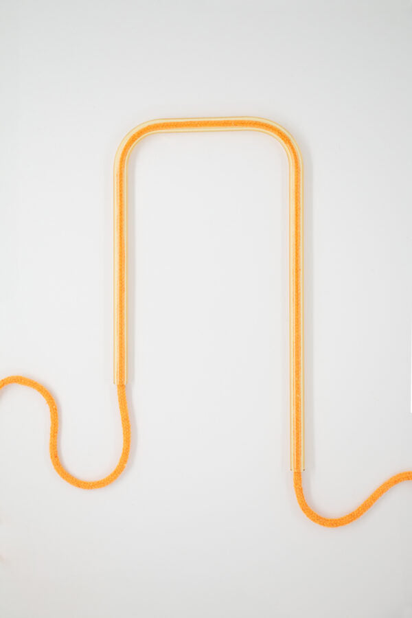 Front view of Citrus Glow glass self-watering insert on a clean white background showing its bright, vibrant yellow and citrus tones.