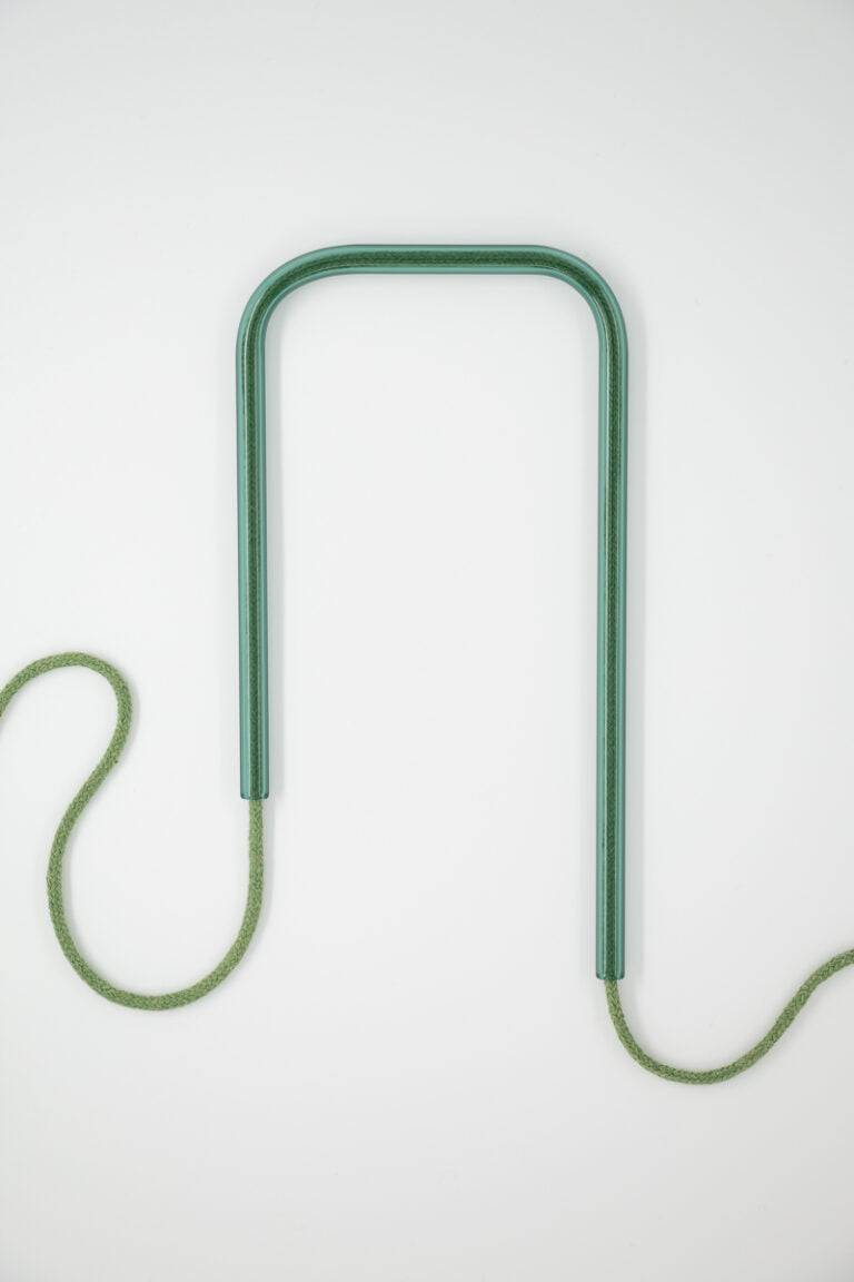 Front view of Deep Moss glass self-watering insert on a clean white background showing its rich forest green and dark earthy tones.