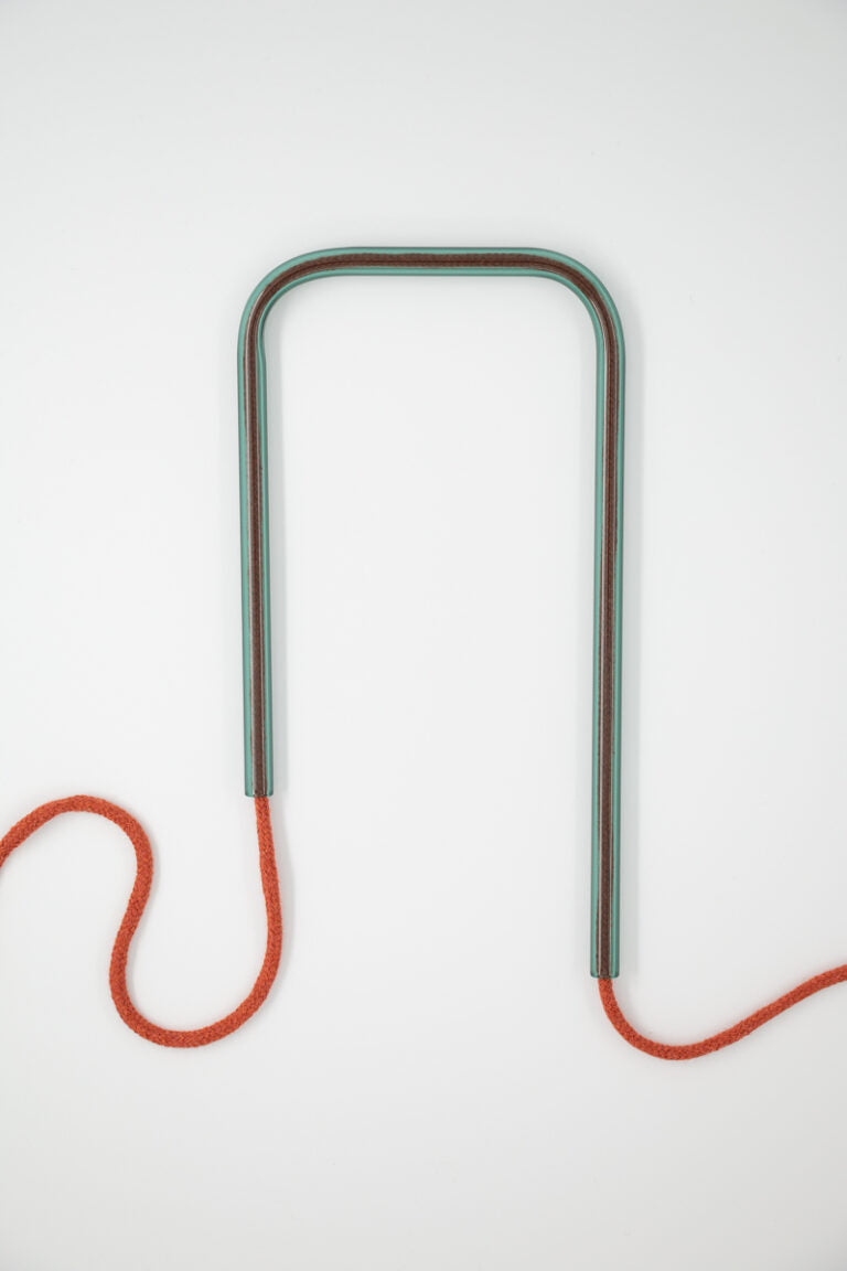 Front view of Lagoon Clay glass self-watering insert on a clean white background showing its deep teal and raw terracotta design.