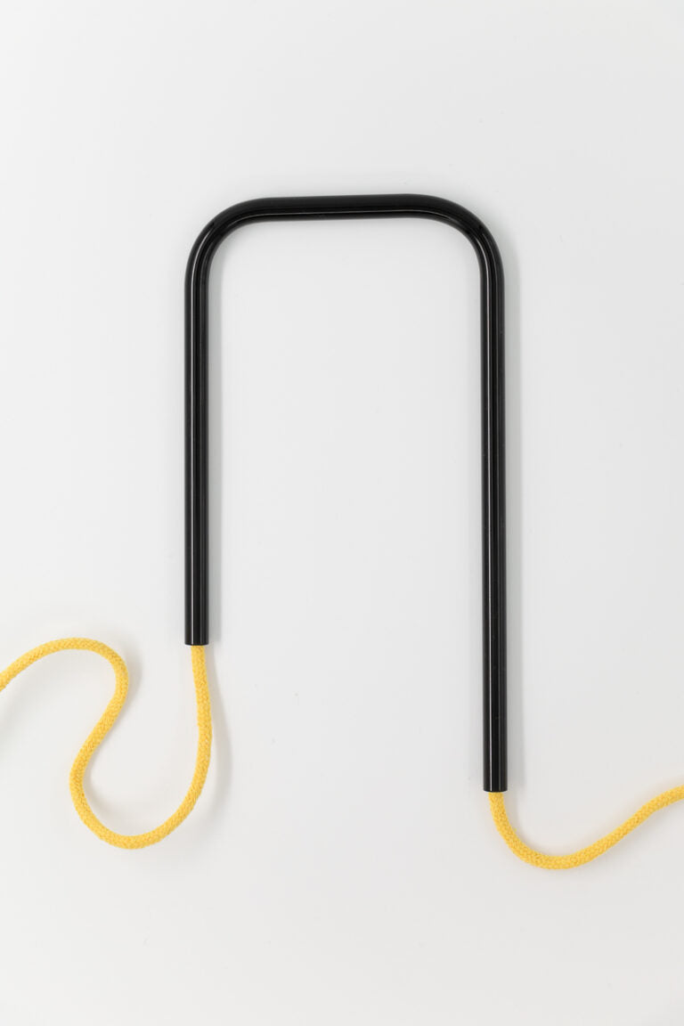Front view of Midnight Sun glass self-watering insert on a clean white background showing its moody dark and golden light accents.